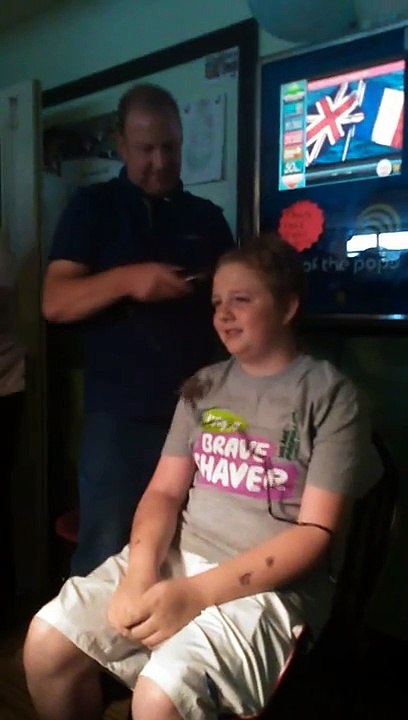 Boy gets head shaved for charity