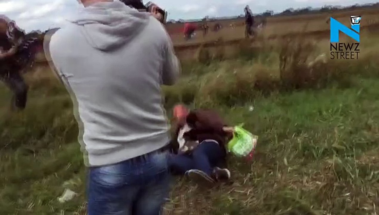 Hungarian journo caught on camera for her inhuman behavior to refugees