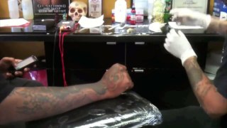 Tucker tattooing knuckles