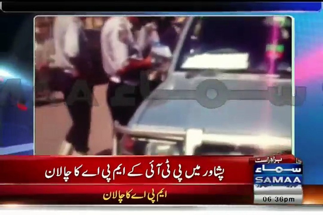 Change in KPK - Traffic Warden issues challan to PTI MPA Mehmood Jan for using mobile phone while driving