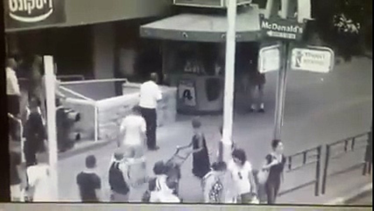 Crazy guy goes on a rampage hitting people, cars, shops and cops in Rishon Lezion, Israel