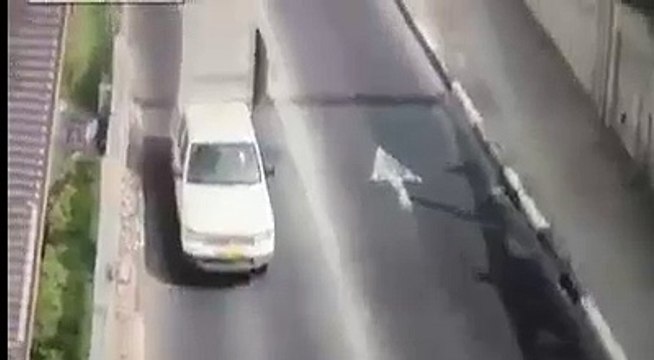 truck knocks down overhead beam