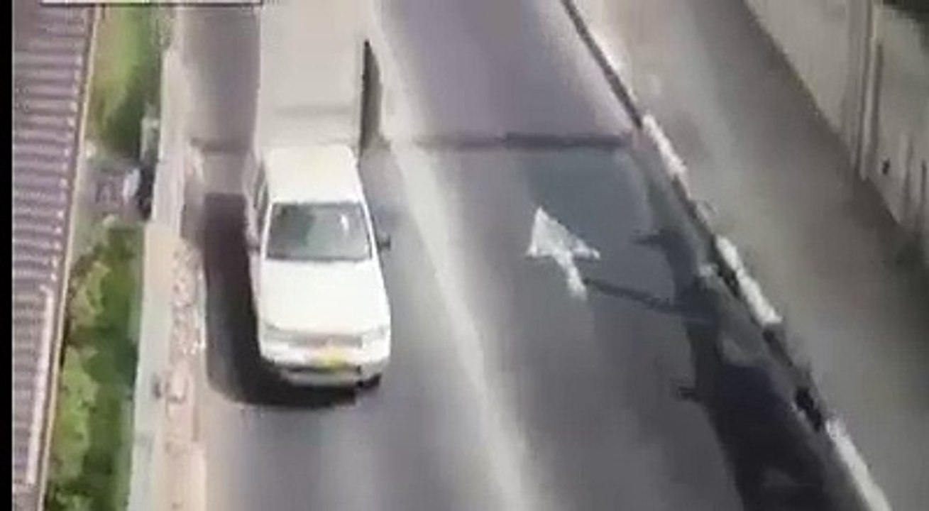 truck knocks down overhead beam