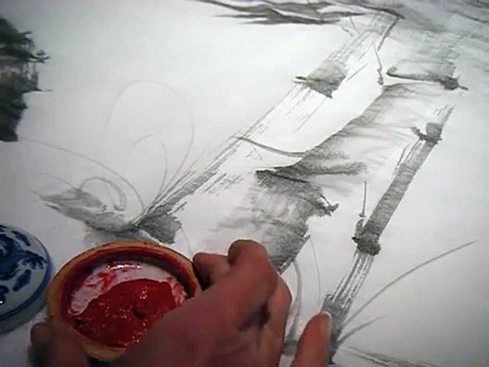 Stamping a traditional Japanese brush painting