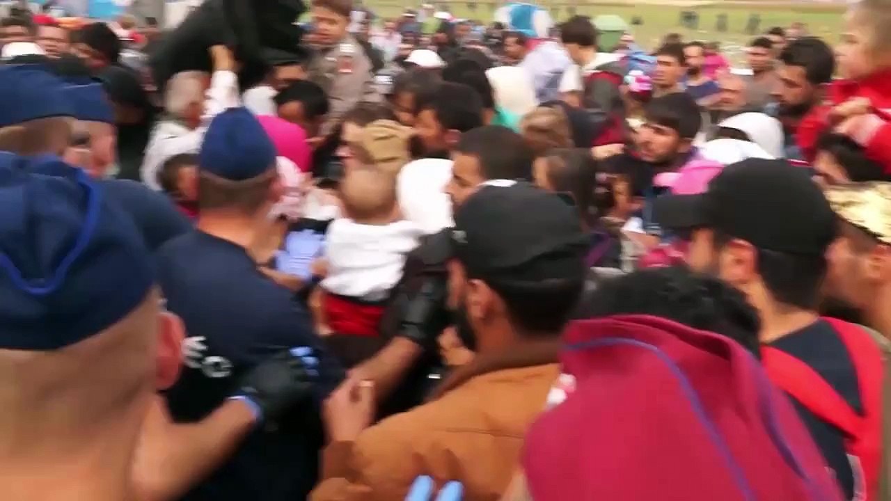 Hungary journalist women Petra Laszlo kicks and tripping Syria refugees -