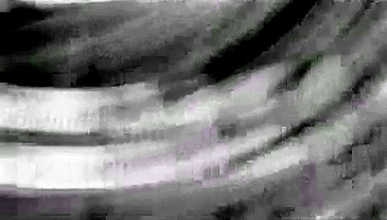T.M_-Strangeness-002-grain