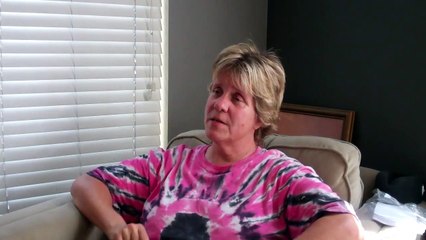 Genita M. Mason interviews a weight loss client during her exit interview