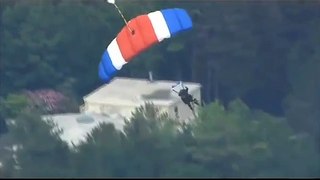 Former President George HW Bush skydives on 90th birthday