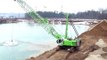 SENNEBOGEN - Quarrying: 6130 Heavy Duty Crawler Crane operating a drag bucket in Austria