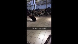 Justin Bieber sleeping with wheels at LaGuardia Airport in New York City - September 4, 2015