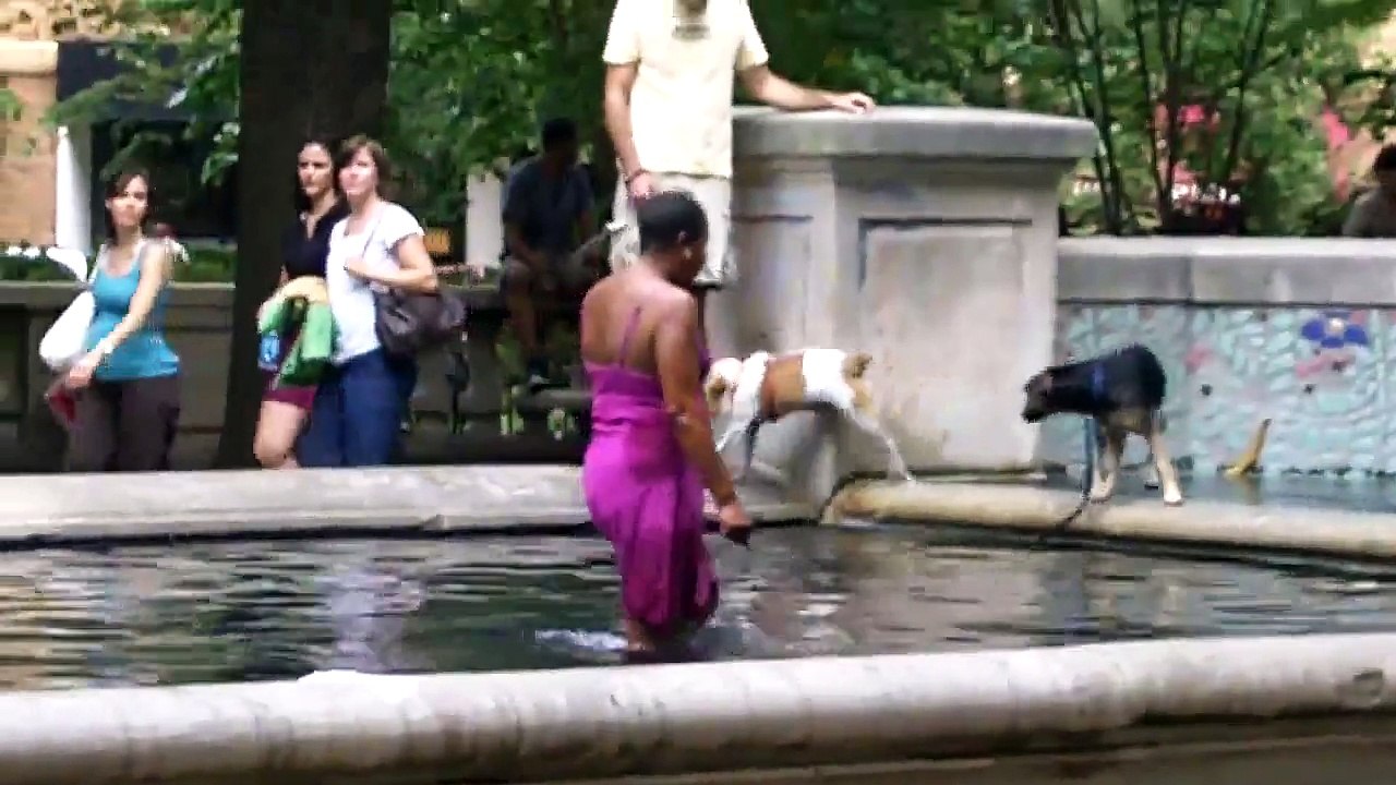 Retarded Lady Takes A Bath In The Fountain