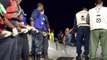 African migrants rescued after boat begins sinking off Italian coast