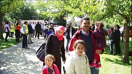 Refugees from Iraq, Syria arrive north-west of Paris