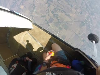 Skydiver solves Rubik's Cube while free-falling!