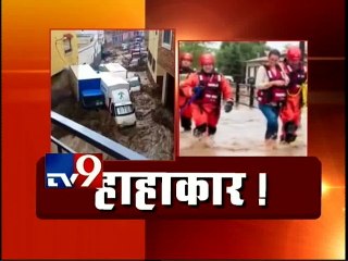 Flash Floods Sweep Vehicles along Spanish Street-TV9