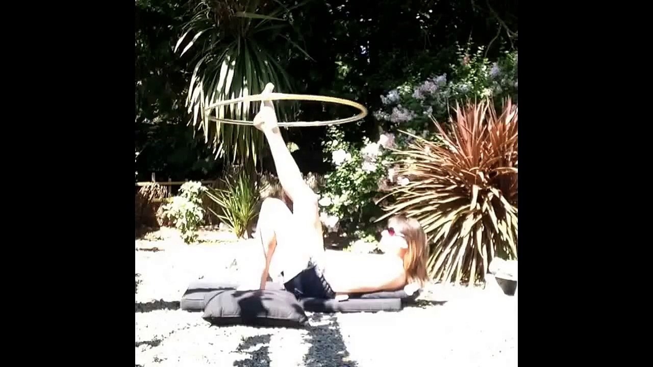 Foot hooping sunbathing