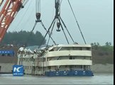 Capsized cruise ship lifted from water