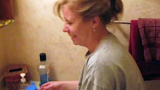 Karen tries out the Neti Pot for the first time.