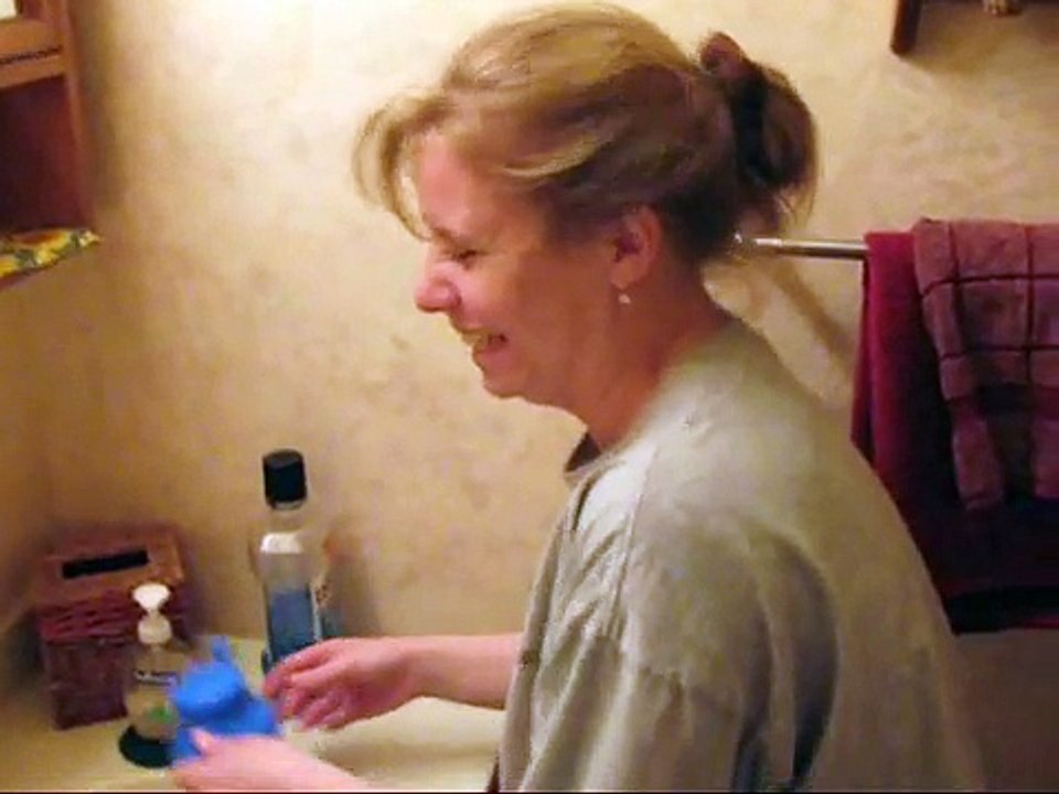Karen tries out the Neti Pot for the first time.