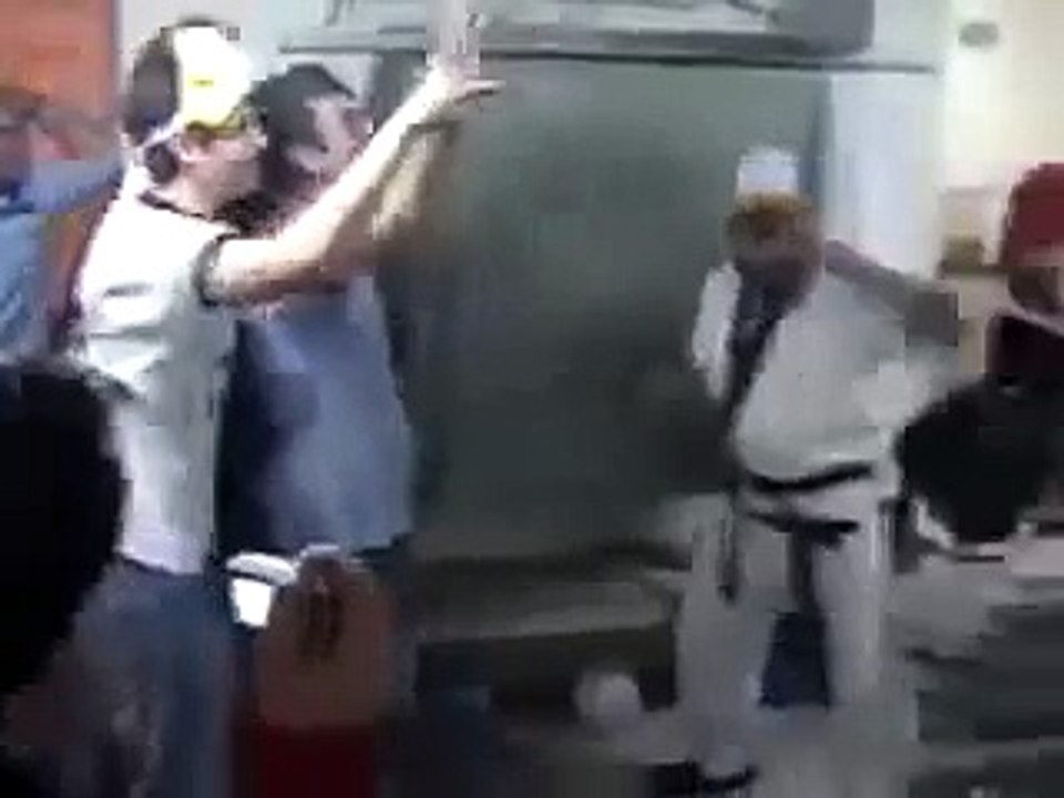 Students & Rabbi Rejoice By Destroying Concrete