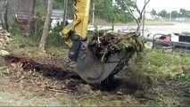 Caterpillar excavator digging a cable trench outside Visby 2012