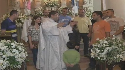 Padre abre as portas da igreja para receber refugiados sírios