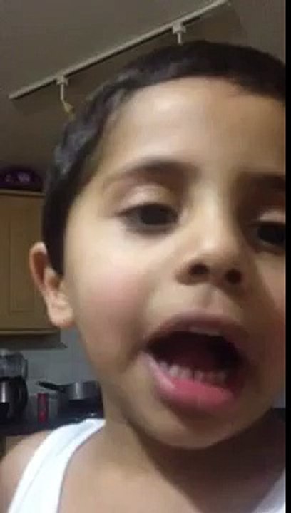 My little bro reading Quran in Arabic