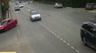 biker slams into turning car and almost flips it !