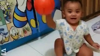 Funny Video 7months old baby dribbling basketball