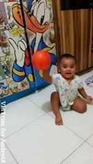 Funny Video 7months old baby dribbling basketball