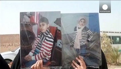 پیکرهای دو کودک مهاجر در کربلا به خاک سپرده شدند