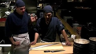 Butchering of a live eel imported from Japan