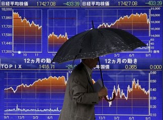 Asian shares get lift from Wall Street, dollar firms