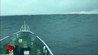 RAW Footage: Japanese ship riding tsunami waves *MUST SEE*