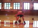 Tim Fanning dribbling two basketballs