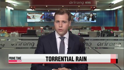 Japan battles floodwaters, searches for missing