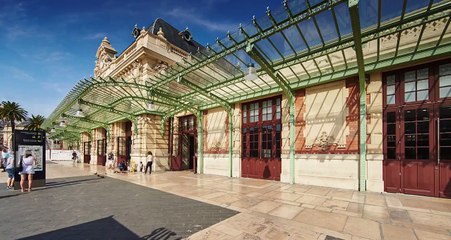 France, Nice, 08.09.2015: Facade of the Train Station Nice Ville, many people with suitcases, 4k