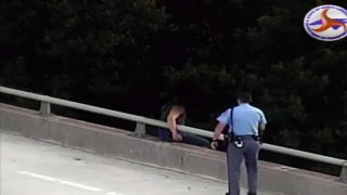 MUST SEE: NC police officer talks man off bridge, gives him a hug