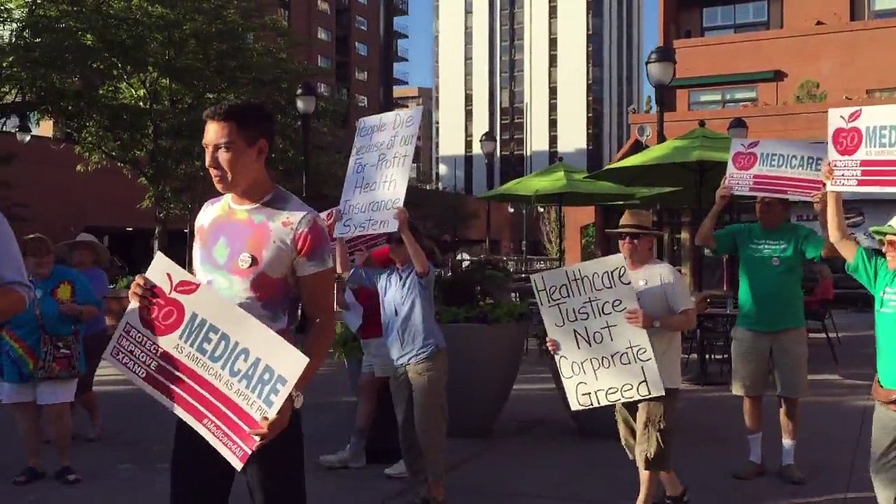 073015 Medicare 50th Denver flash mob