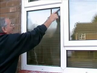 How to wash a window using a mop and squeegee