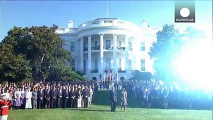 أوباما وزوجته يقفان دقيقة صمت في الذكرى 14 لأحداث 11 من سبتمبر