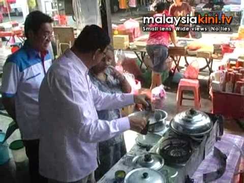 PAS candidate meet police at multiracial pasar