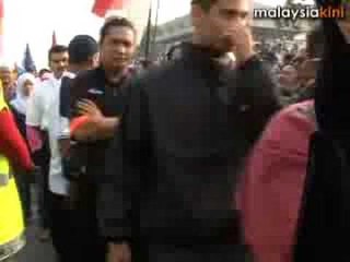Anwar is escorted by overwhelming numbers