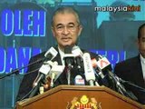 PM unveils trimmed-down cabinet