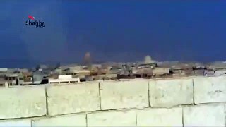 (12-20-13) Hayan | Aleppo | Regime Shell Explodes Near Videographer