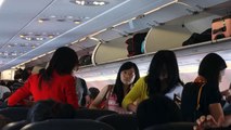 Passengers boarding an Air Asia flight in Chiang Mai