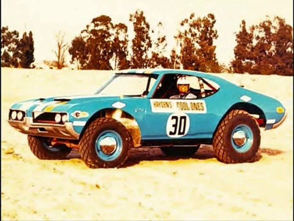 JAMES GARNER AND THE GOODYEAR GRABBER BAJA AND BANSHEE OLDSMOBILE 442