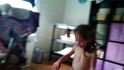Zoe running around shirtless (and admiring herself in the mirror)