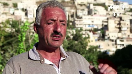 East Jerusalem settlers plant their flag among Arabs