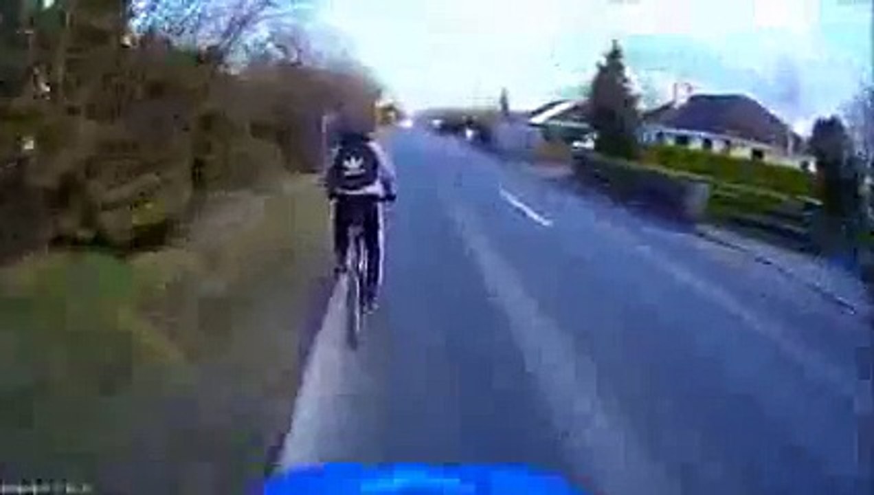 Crazy woman overtake cyclist crash